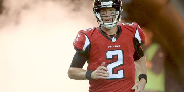 Aug 14, 2015; Atlanta, GA, USA; Atlanta Falcons quarterback Matt Ryan (2) runs onto the field before their game against the Tennessee Titans in a preseason NFL football game at Georgia Dome. Mandatory Credit: Jason Getz-USA TODAY Sports