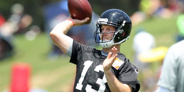 Jun 17, 2015; Atlanta, GA, USA; Atlanta Falcons quarterback T.J. Yates (13) throws a pass during minicamp at Falcons Training Facility. Mandatory Credit: Brett Davis-USA TODAY Sports