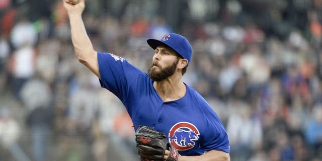 August 25, 2015; San Francisco, CA, USA; Chicago Cubs starting pitcher Jake Arrieta (49) delivers a pitch during the first inning against the San Francisco Giants at AT&T Park. Mandatory Credit: Kyle Terada-USA TODAY Sports