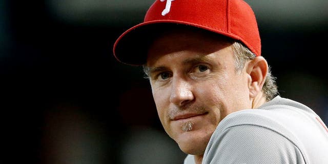 PHOENIX, AZ - AUGUST 12: Chase Utley #26 of the Philadelphia Phillies watches from the dugout during the MLB game against the Arizona Diamondbacks at Chase Field on August 12, 2015 in Phoenix, Arizona. The Phillies defeated the Diamondbacks 7-6. (Photo by Christian Petersen/Getty Images)