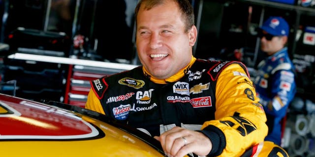 BROOKLYN, MI - AUGUST 15: Ryan Newman, driver of the #31 Caterpillar Chevrolet, climbs into his car during practice for the NASCAR Sprint Cup Series Pure Michigan 400 at Michigan International Speedway on August 15, 2015 in Brooklyn, Michigan. (Photo by Gregory Shamus/Getty Images)