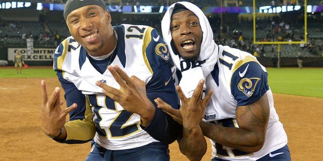 Aug 14, 2015; Oakland, CA, USA; St. Louis Rams receivers Stedman Bailey (12) and Tavon Austin (11) pose after the preseason NFL game against the Oakland Raiders at O.co Coliseum. Mandatory Credit: Kirby Lee-USA TODAY Sports