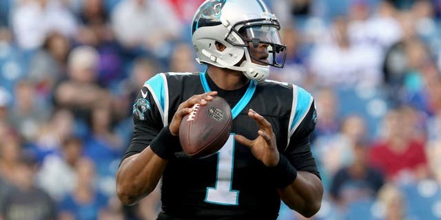 Aug 14, 2015; Orchard Park, NY, USA; Carolina Panthers quarterback Cam Newton (1) looks to make a pass attempt during the first quarter against the Buffalo Bills in a preseason NFL football game at Ralph Wilson Stadium. Mandatory Credit: Timothy T. Ludwig-USA TODAY Sports