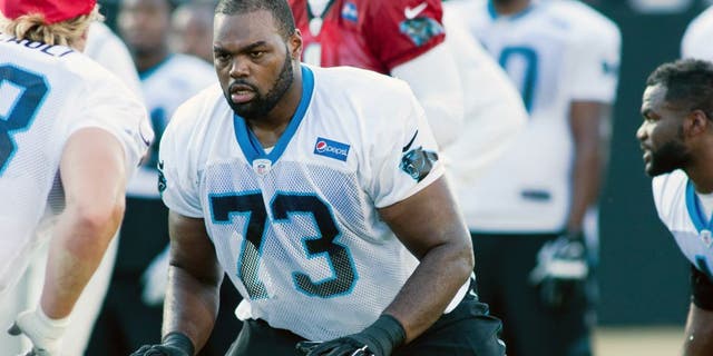 Jul 31, 2015; Spartanburg, SC, USA; Carolina Panthers tackle Michael Oher (73) looks to block during a drill in training camp held at Wofford College. Mandatory Credit: Jeremy Brevard-USA TODAY Sports
