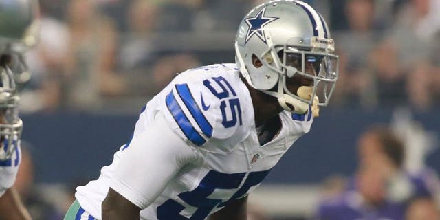 Aug 16, 2014; Arlington, TX, USA; Dallas Cowboys linebacker Rolando McClain (55) in game action against the Baltimore Ravens at AT&T Stadium. Baltimore beat Dallas 37-30. Mandatory Credit: Tim Heitman-USA TODAY Sports