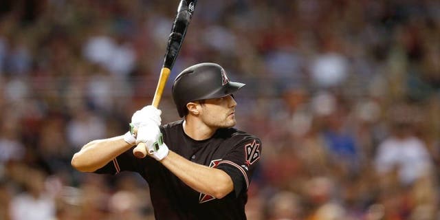 PHOENIX, AZ - JULY 18: A.J. Pollock #11 of the Arizona Diamondbacks bats against the San Francisco Giants during the MLB game at Chase Field on July 18, 2015 in Phoenix, Arizona. The Giants defeated the Diamondbacks 8-4. (Photo by Christian Petersen/Getty Images)