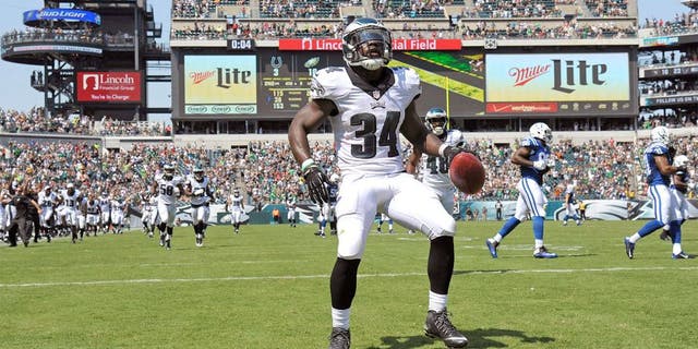 Aug 16, 2015; Philadelphia, PA, USA; Philadelphia Eagles running back Kenjon Barner (34) celebrates after scoring a 94-yard punt return touchdown during the second quarter against the Indianapolis Colts in a preseason NFL football game at Lincoln Financial Field. Mandatory Credit: Eric Hartline-USA TODAY Sports