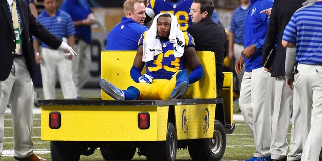 Dec 21, 2014; St. Louis, MO, USA; St. Louis Rams cornerback E.J. Gaines (33) is carted off the field after being injured against the New York Giants during the second half at the Edward Jones Dome. The New York Giants defeat the St. Louis Rams 37-27. Mandatory Credit: Jasen Vinlove-USA TODAY Sports