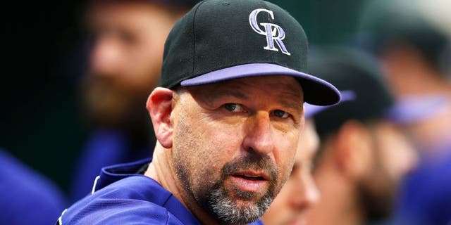 NEW YORK, NY - AUGUST 10: Manager Walt Weiss #22 of the Colorado Rockies in action against the New York Mets on August 10, 2015 at Citi Field in the Flushing neighborhood of the Queens borough of New York City. (Photo by Rich Schultz/Getty Images)