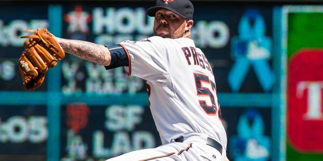 Jun 21, 2015; Minneapolis, MN, USA; Minnesota Twins relief pitcher Ryan Pressly (57) Minnesota Twins throws a pitch during the sixth inning against the Chicago Cubs at Target Field. The Cubs won 8-0. Mandatory Credit: Jeffrey Becker-USA TODAY Sports