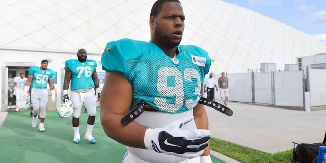 Aug 11, 2015; Davie, FL, USA; Miami Dolphins defense tackle Ndamukong Suh (93) during training camp at Doctors Hospital Training Facility. Mandatory Credit: Steve Mitchell-USA TODAY Sports