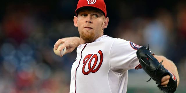 Aug 19, 2014; Washington, DC, USA; Washington Nationals starting pitcher Stephen Strasburg (37) pitches during the first inning against the Arizona Diamondbacks at Nationals Park. Mandatory Credit: Tommy Gilligan-USA TODAY Sports