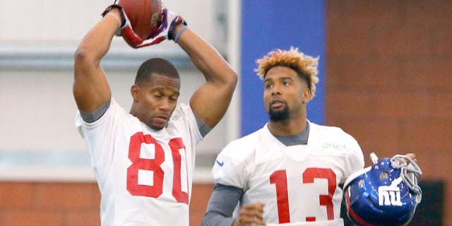 Jun 8, 2015; East Rutherford, NJ, USA; New York Giants wide receiver Victor Cruz (80) and New York Giants wide receiver Odell Beckham (13) during organized team activities at Quest Diagnostics Training Center. Mandatory Credit: Noah K. Murray-USA TODAY