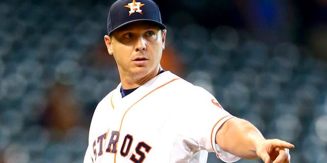 Aug 17, 2015; Houston, TX, USA; Houston Astros pitcher Scott Kazmir reacts in the first inning against the Tampa Bay Rays at Minute Maid Park. Mandatory Credit: Mark J. Rebilas-USA TODAY Sports