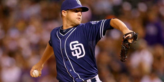DENVER, CO - AUGUST 14: Relief pitcher Bud Norris #20 of the San Diego Padres delivers to home plate during the sixth inning against the Colorado Rockies at Coors Field on August 14, 2015 in Denver, Colorado. The Padres defeated the Rockies 9-5. (Photo by Justin Edmonds/Getty Images)