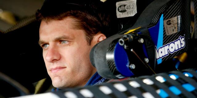 BROOKLYN, MI - AUGUST 15: David Ragan, driver of the #55 Aaron's Dream Machine Online Version Toyota, prepares to drive during practice for the NASCAR Sprint Cup Series Pure Michigan 400 at Michigan International Speedway on August 15, 2015 in Brooklyn, Michigan. (Photo by Gregory Shamus/Getty Images)
