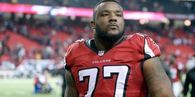 Nov 30, 2014; Atlanta, GA, USA; Atlanta Falcons defensive end Ra'Shede Hageman (77) walks off of the field after the Falcons win over the Arizona Cardinals at the Georgia Dome. The Falcons won 29-18. Mandatory Credit: Jason Getz-USA TODAY Sports