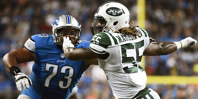 Aug 13, 2015; Detroit, MI, USA; New York Jets outside linebacker Lorenzo Mauldin (55) gets past Detroit Lions tackle Michael Williams (73) during the second quarter in a preseason NFL football game at Ford Field. Mandatory Credit: Tim Fuller-USA TODAY Sports
