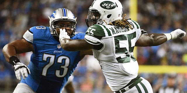 Aug 13, 2015; Detroit, MI, USA; New York Jets outside linebacker Lorenzo Mauldin (55) gets past Detroit Lions tackle Michael Williams (73) during the second quarter in a preseason NFL football game at Ford Field. Mandatory Credit: Tim Fuller-USA TODAY Sports