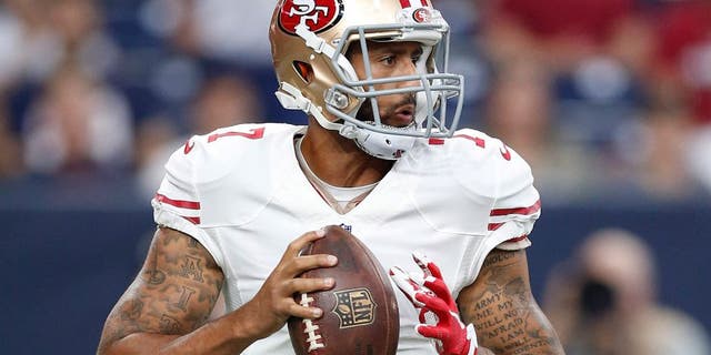 Aug 15, 2015; Houston, TX, USA; San Francisco 49ers quarterback Colin Kaepernick (7) drops back to pass against the Houston Texans in a preseason NFL football game at NRG Stadium. Mandatory Credit: Matthew Emmons-USA TODAY Sports