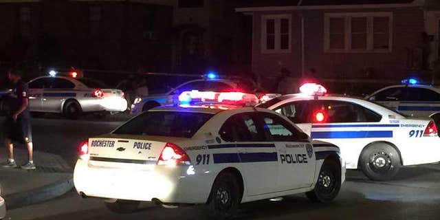 Police vehicles are seen in Rochester, N.Y., Aug. 19, 2015. (Associated Press)