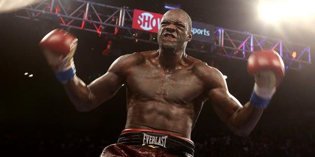 BIRMINGHAM, AL - JUNE 13: WBC World Heavyweight Champion Deontay Wilder celebrates his knockdown of Eric Molina at the Bartow Arena on June 13, 2015 in Birmingham, Alabama. (Photo by David A. Smith/Getty Images)