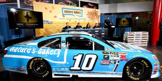 KANNAPOLIS, NC - AUGUST 18: (L-R) Sam and Dave Marson, co-founders of Nature's Bakery, Danica Patrick, driver of the #10 Stewart-Haas Racing Chevrolet, and Tony Stewart, co-owner of Stewart-Haas Racing, announce a multiyear deal partnership as Mike Arning of True Speed Communication looks on during a press conference on August 18, 2015 in Kannapolis, North Carolina. The partnership will begin with the 2016 NASCAR Sprint Cup Series season. (Photo by Jared C. Tilton/Getty Images for Stewart-Haas Racing)