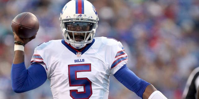 Aug 14, 2015; Orchard Park, NY, USA; Buffalo Bills quarterback Tyrod Taylor (5) throws a pass during the first half against the Carolina Panthers in a preseason NFL football game at Ralph Wilson Stadium. Mandatory Credit: Timothy T. Ludwig-USA TODAY Sports