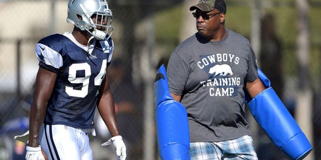 Aug 1, 2015; Oxnard, CA, USA; Dallas Cowboys defensive end Randy Gregory (94) with Cowboys former defensive end Charles Haley at training camp at River Ridge Fields. Mandatory Credit: Kirby Lee-USA TODAY Sports