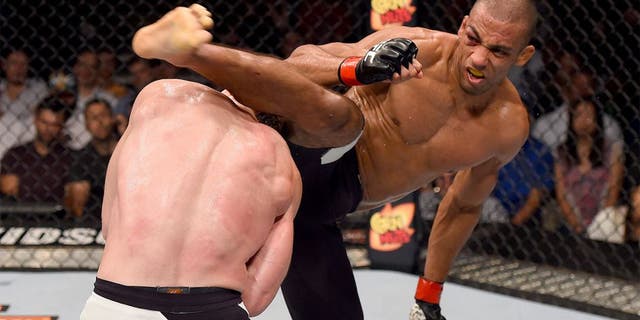 CHICAGO, IL - JULY 25: (R-L) Edson Barboza of Brazil kicks Paul Felder in their lightweight bout during the UFC event at the United Center on July 25, 2015 in Chicago, Illinois. (Photo by Jeff Bottari/Zuffa LLC/Zuffa LLC via Getty Images)