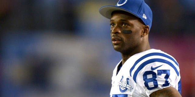 Oct 14, 2013; San Diego, CA, USA; Indianapolis Colts receiver Reggie Wayne (87) watches on the sidelines during the game against the San Diego Chargers at Qualcomm Stadium. The Chargers defeated the Colts 19-9. Mandatory Credit: Kirby Lee-USA TODAY Sports
