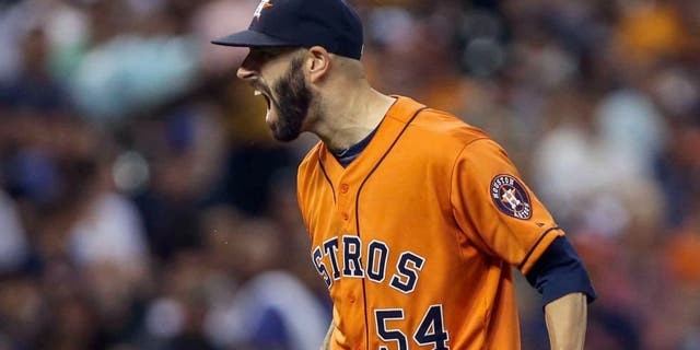 Aug 21, 2015; Houston, TX, USA; Houston Astros starting pitcher Mike Fiers (54) reacts after getting a strikeout during the seventh inning against the Los Angeles Dodgers at Minute Maid Park. Mandatory Credit: Troy Taormina-USA TODAY Sports