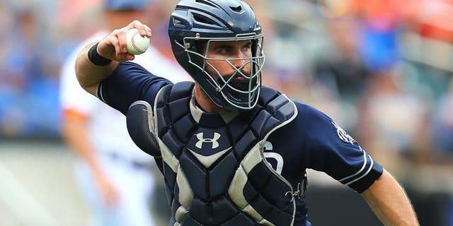 NEW YORK, NY - JULY 30: Austin Hedges #18 of the San Diego Padres in action against the New York Mets at Citi Field on July 30, 2015 in Flushing neighborhood of the Queens borough of New York City. Padres defeated the Mets 8-7. (Photo by Mike Stobe/Getty Images)