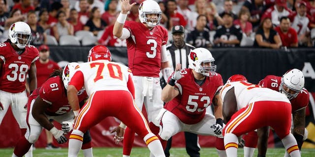 GLENDALE, AZ - AUGUST 15: Quarterback Carson Palmer #3 of the Arizona Cardinals prepares to snap the football during the pre-season NFL game against the Kansas City Chiefs at the University of Phoenix Stadium on August 15, 2015 in Glendale, Arizona. (Photo by Christian Petersen/Getty Images)