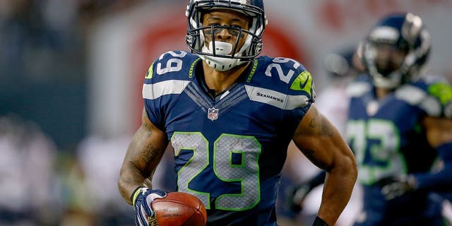 SEATTLE, WA - AUGUST 22: Punt returner Earl Thomas #29 of the Seattle Seahawks reacts after returning a punt for a long gain against the Chicago Bears at CenturyLink Field on August 22, 2014 in Seattle, Washington. (Photo by Otto Greule Jr/Getty Images)