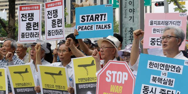 Aug. 22, 2016: South Korean protesters shout slogans during a rally demanding to stop the joint military exercises, Ulchi Freedom Guardian, or UFG, between the U.S. and South Korea near U.S. Embassy in Seoul, South Korea.