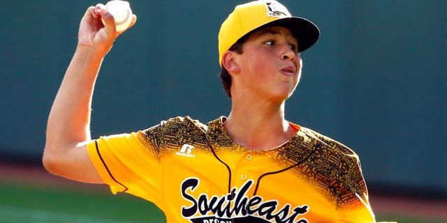 Taylors, South Carolina pitcher Alex Edmondson delivers during the first inning of a baseball game in United States pool play against Cranston, Rhode Island at the Little League World Series tournament in South Williamsport, Pa., Friday, Aug. 21, 2015. (AP Photo/Gene J. Puskar)