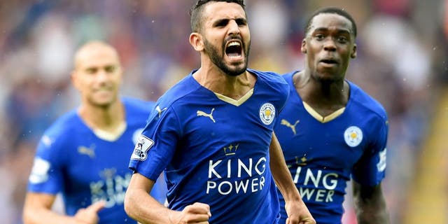 LEICESTER, ENGLAND - AUGUST 22: Riyad Mahrez of Leicester City celebrates scoring his team's first goal during the Barclays Premier League match between Leicester City and Tottenham Hotspur at The King Power Stadium on August 22, 2015 in Leicester, England. (Photo by Michael Regan/Getty Images)