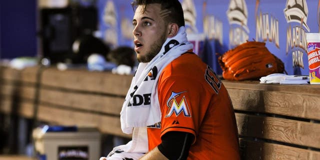 Aug 2, 2015; Miami, FL, USA; Miami Marlins starting pitcher Jose Fernandez (16) sits in the dugout during the first inning against the San Diego Padres at Marlins Park. Mandatory Credit: Steve Mitchell-USA TODAY Sports