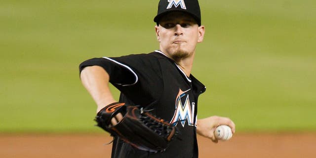 Aug 22, 2015; Miami, FL, USA; Miami Marlins starting pitcher Justin Nicolino (60) throws the ball against the Philadelphia Phillies during the first inning at Marlins Park. Mandatory Credit: Steve Mitchell-USA TODAY Sports