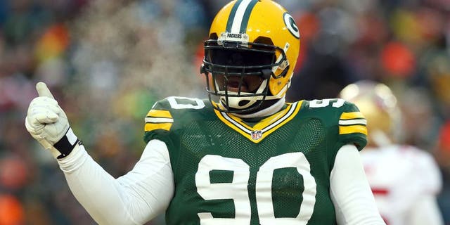 GREEN BAY, WI - JANUARY 05: B.J. Raji #90 of the Green Bay Packers celebrates a incomplete pass by the San Francisco 49ers in the first quarter during their NFC Wild Card Playoff game at Lambeau Field on January 5, 2014 in Green Bay, Wisconsin. (Photo by Ronald Martinez/Getty Images)