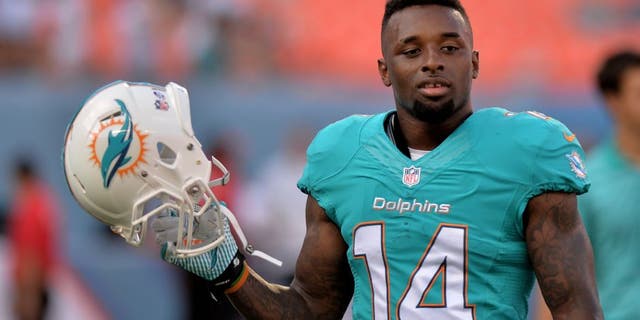 Aug 23, 2014; Miami Gardens, FL, USA; Miami Dolphins wide receiver Jarvis Landry (14) prior to a game against the Dallas Cowboys at Sun Life Stadium. Mandatory Credit: Steve Mitchell-USA TODAY Sports