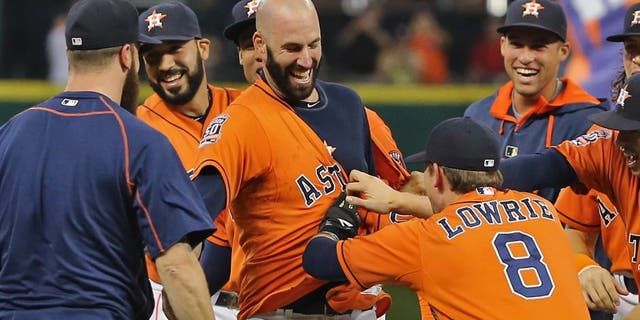 HOUSTON, TX - AUGUST 21: Mike Fiers #54 of the Houston Astros celebrates with his teammates tossing a no-hitter en route to the Astros defeating the Los Angeles Dodgers 3-0 at Minute Maid Park on August 21, 2015 in Houston, Texas. (Photo by Scott Halleran/Getty Images)