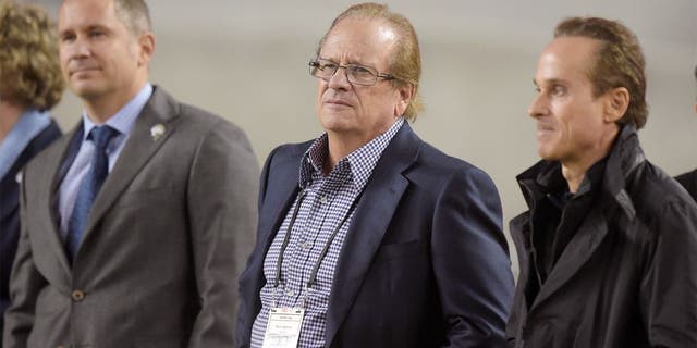 Dec 20, 2014; Santa Clara, CA, USA; San Diego Chargers president Dean Spanos (center) is flanked by chief executive officer A.G. Spanos (left) and executive vice president Michael Spanos during the game against the San Francisco 49ers at Levi's Stadium. Mandatory Credit: Kirby Lee-USA TODAY Sports