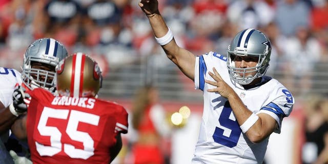 Dallas Cowboys quarterback Tony Romo (9) passes as San Francisco 49ers linebacker Ahmad Brooks (55) applies pressure during the first half of an NFL preseason football game in Santa Clara, Calif., Sunday, Aug. 23, 2015. (AP Photo/Ben Margot)