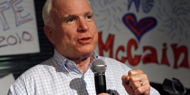 Aug. 23: Sen. John McCain speaks during a campaign stop at his headquarters in Phoenix.