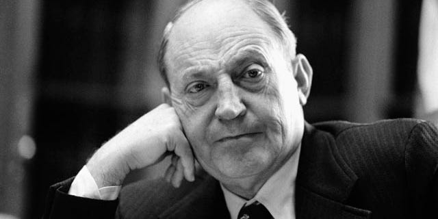 In this Jan. 16, 1975 file photo, former U.S. Attorney General William B. Saxbe listens to a question during an interview in his Washington office.