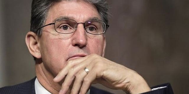 In this March 29, 2011, file photo Senate Armed Services Committee member Sen. Joe Manchin, D-W.Va. listens to testimony on Capitol Hill in Washington.
