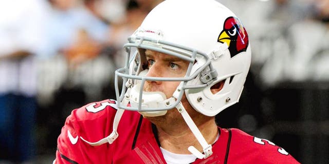 Aug 9, 2014; Glendale, AZ, USA; Arizona Cardinals quarterback Carson Palmer (3) warms up prior to the game against the Houston Texans at University of Phoenix Stadium. Mandatory Credit: Matt Kartozian-USA TODAY Sports