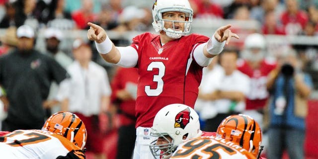 Aug 24, 2014; Glendale, AZ, USA; Arizona Cardinals quarterback Carson Palmer (3) signals to teammates prior to the snap during the first half against the Cincinnati Bengals at University of Phoenix Stadium. Mandatory Credit: Matt Kartozian-USA TODAY Sports